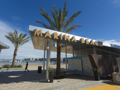 Marina Beach also goes by the local nickname, Mother's Beach, because of the area's family-friendly amenities including covered picnic pavilions, wave-free swimming area, and a children's playground.