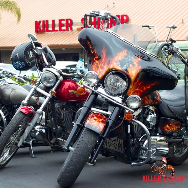 motorcycles parked in front of Killer Shrimp