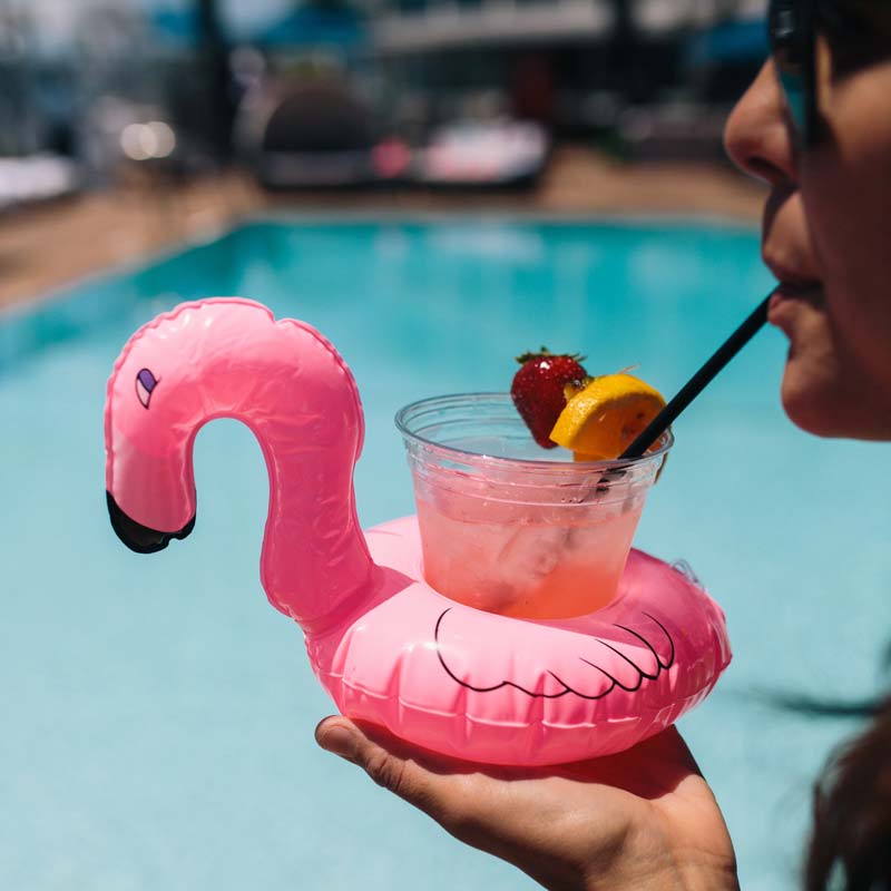 poolside drink in flamingo floatie