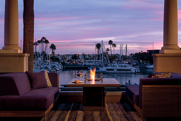 outdoor firepit seating with marina view