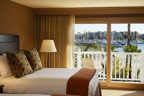hotel bedroom with view of marina