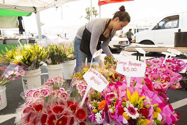 woman working flower booth