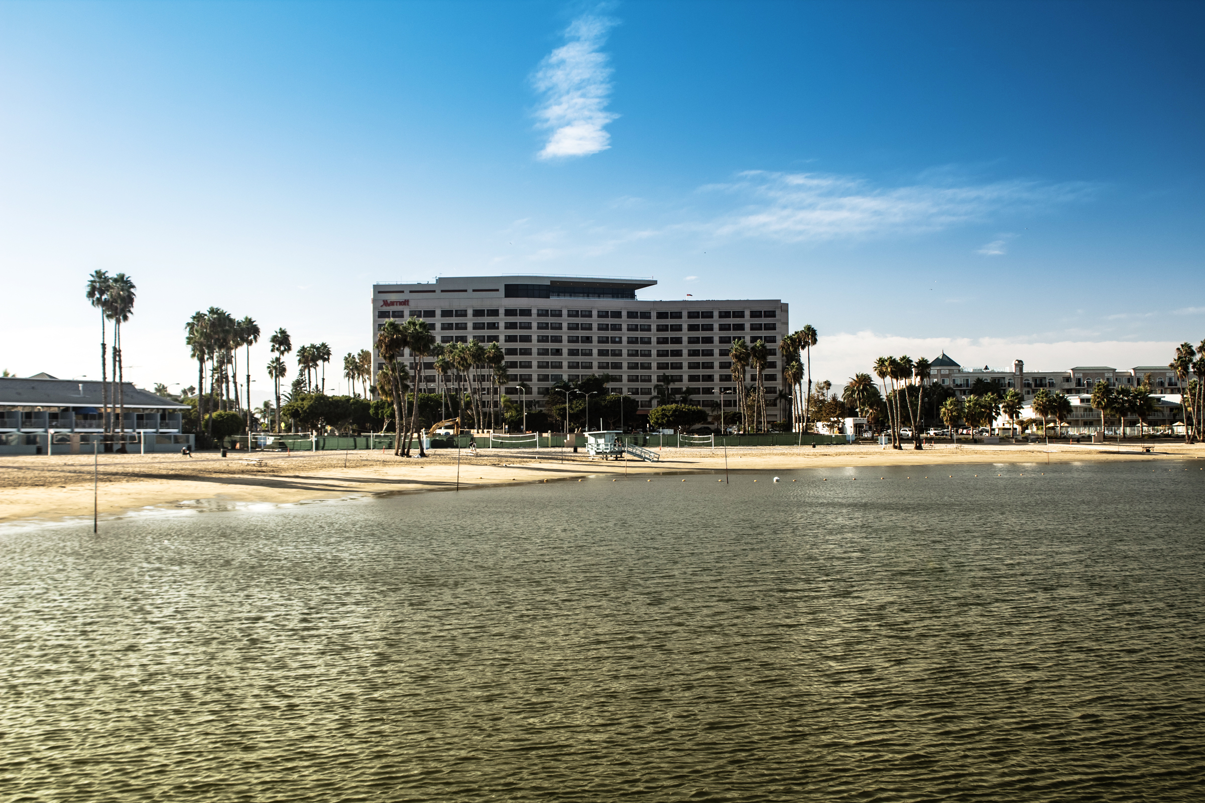 view of Marriott hotel building from the beach and sea