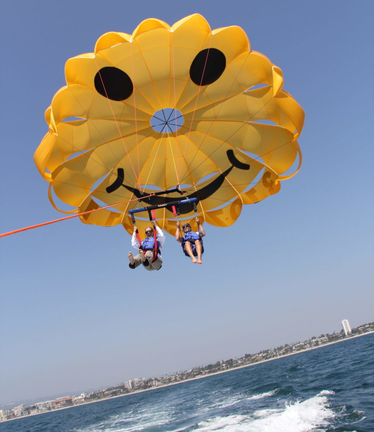 parasailing over Pacific Ocean
