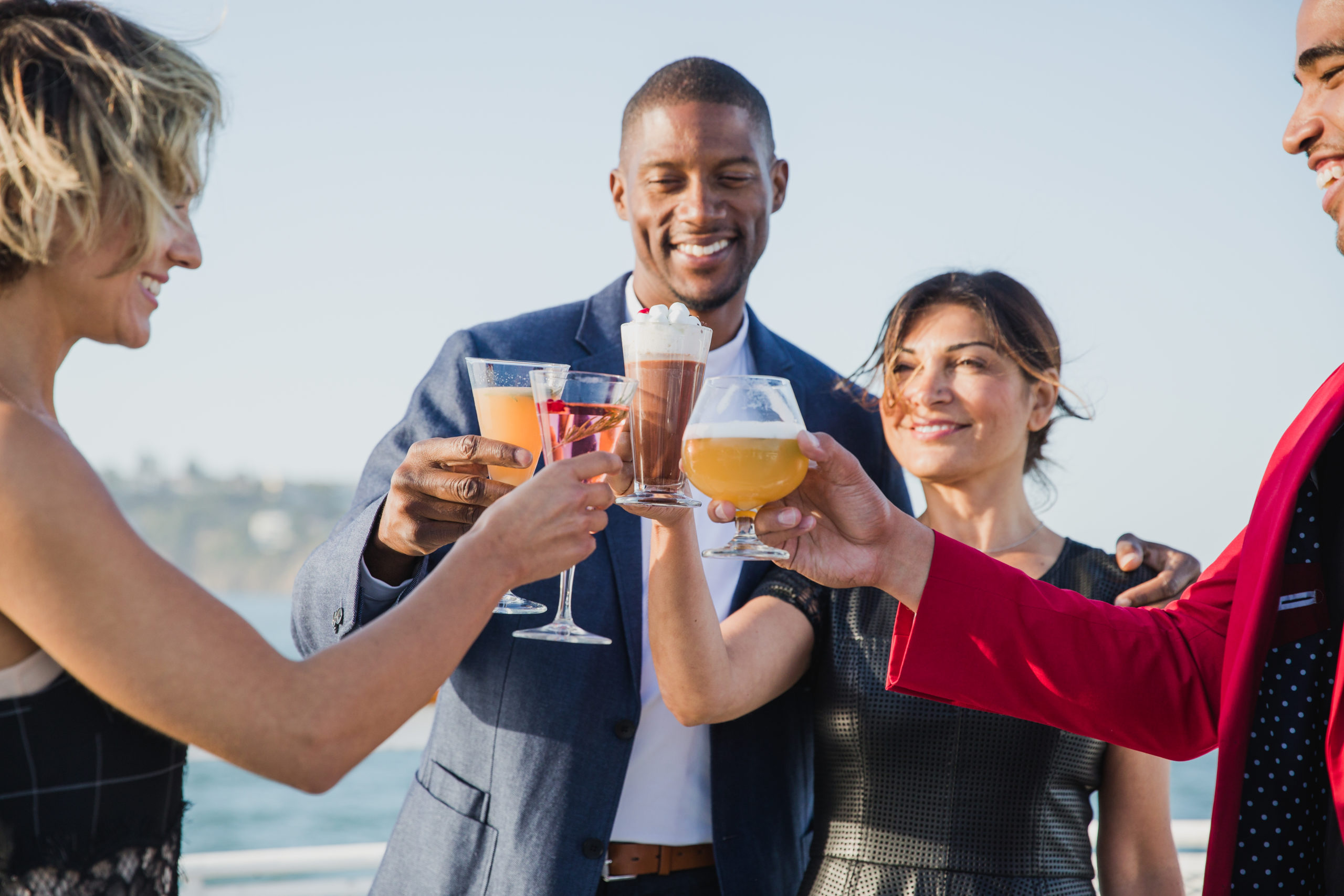Holiday party toast on yacht with City Cruises
