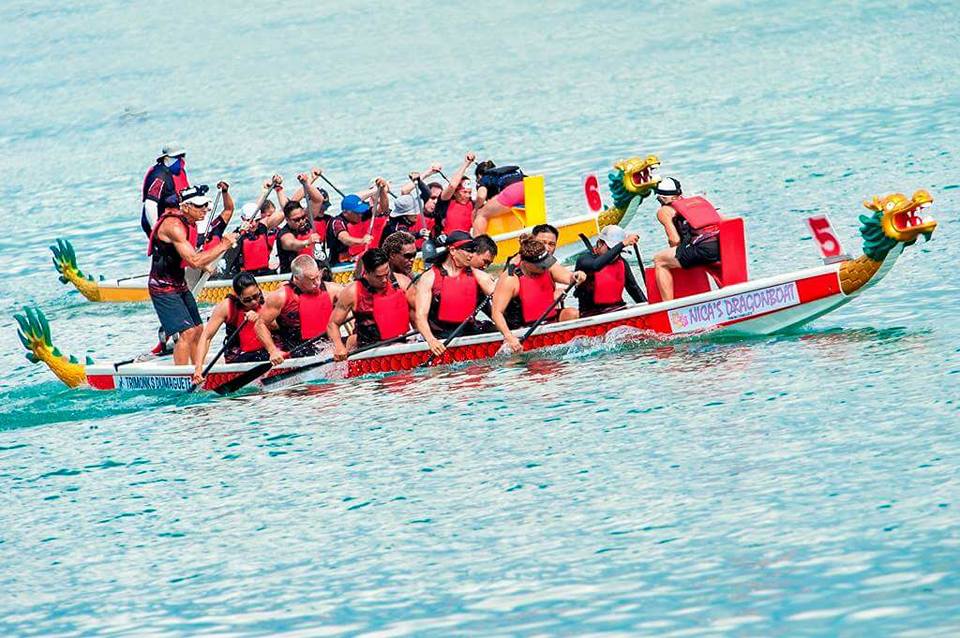 Dragon boat racing teams on the ocean