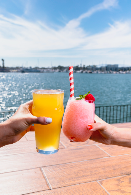 Two frozen drinks with ocean in background