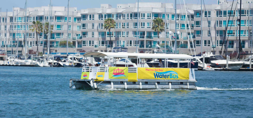 Ride the WaterBus, an open-air water taxi in the Marina del Rey harbor